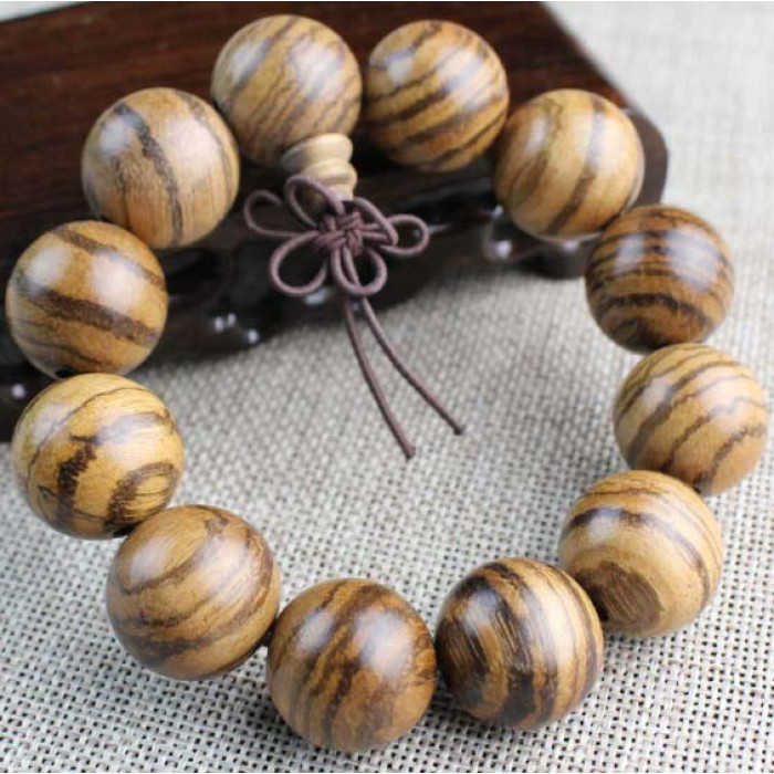Prayer beads bracelet with a tassel made of Vietnamese Agar 20mm.