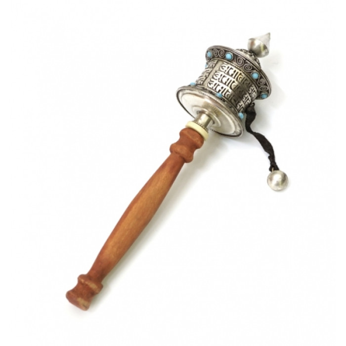 Prayer wheel on the handle in silver color