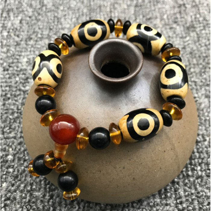 Bracelet "5 yellow beads DZI" 3 eyes with amber