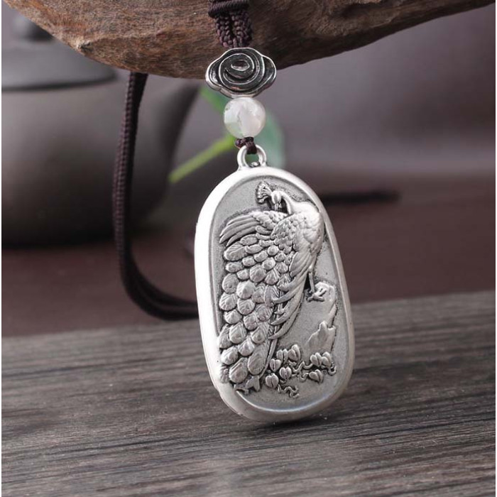 Metal pendant Peacock