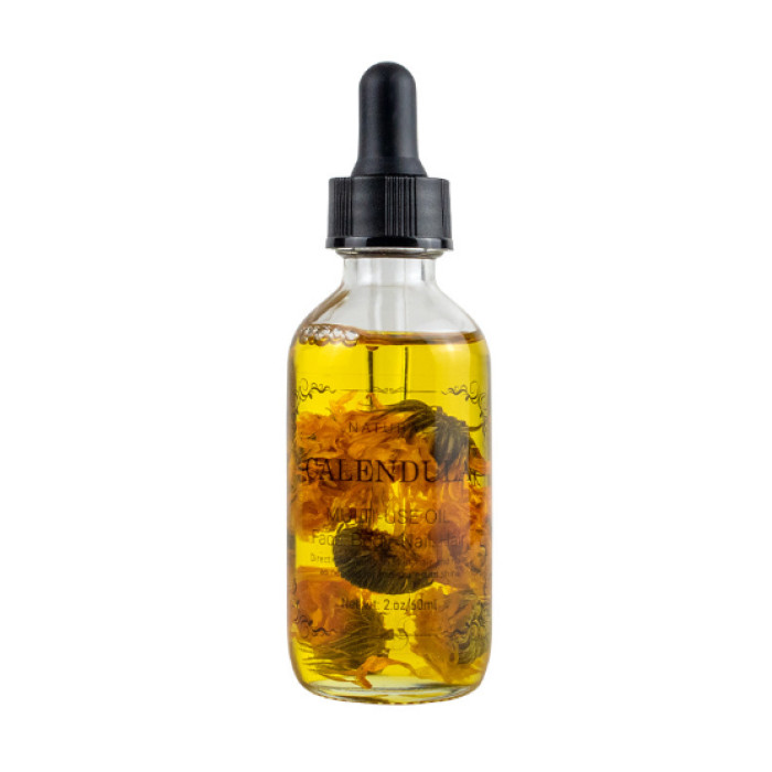 Massage oil with Calendula herbs 60 ml.