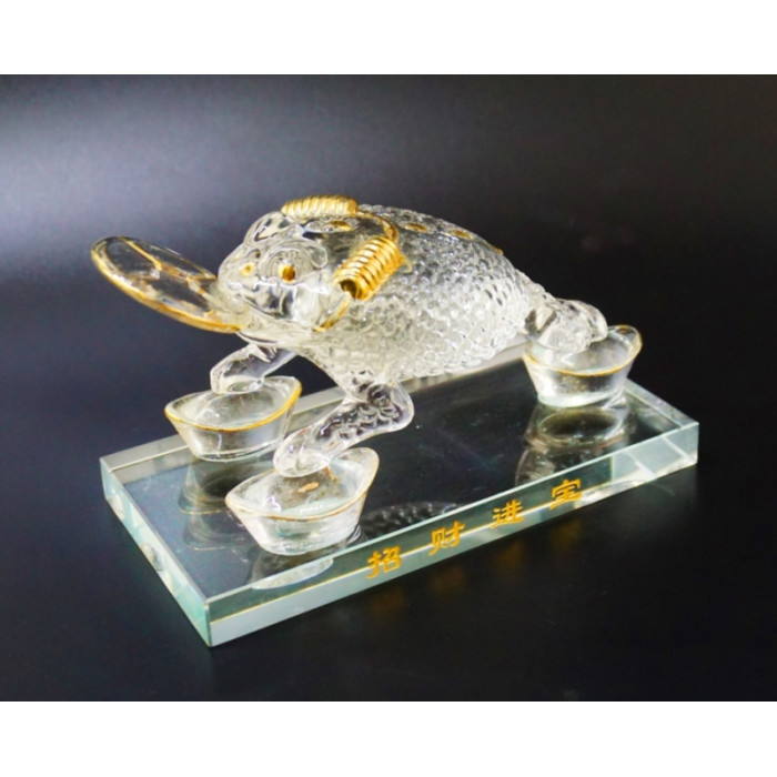 Toad of wealth glass with a coin