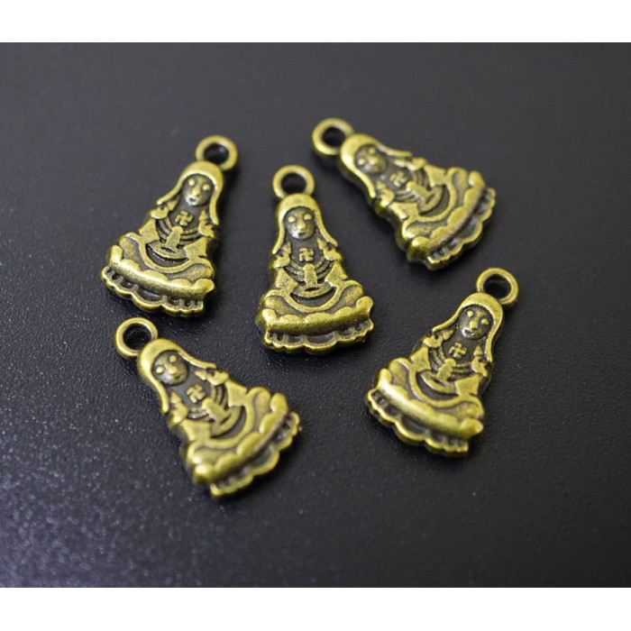 Amulet in Kuan Yin's purse under bronze 10 pieces