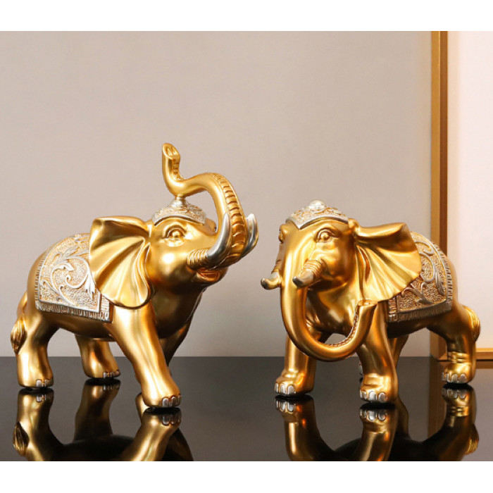 Пара слонів у золотому кольорі