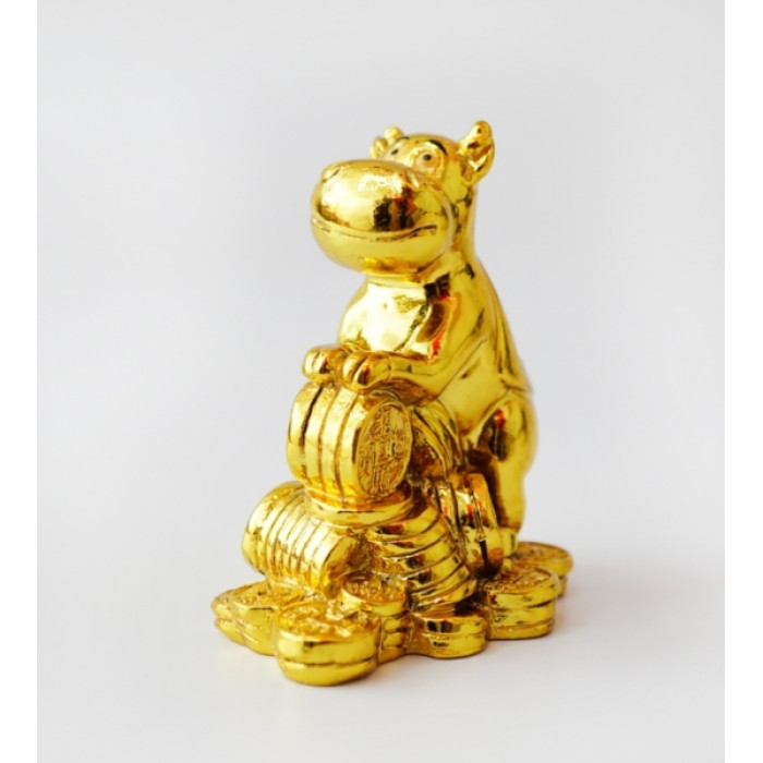 Bull with coins golden color