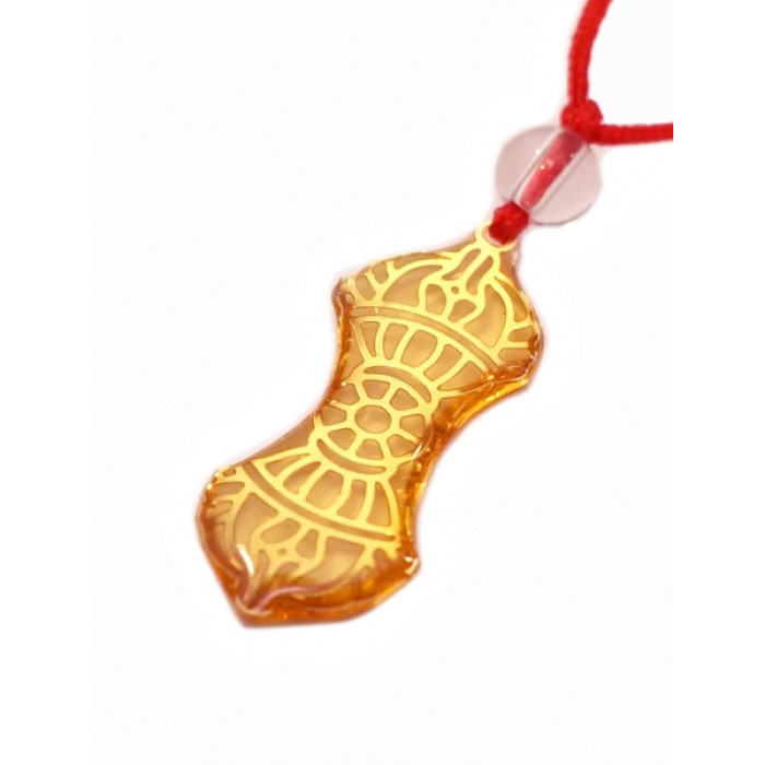 Buddhist amulet in plastic on a Vajra cord