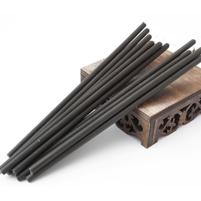 Black wax candle