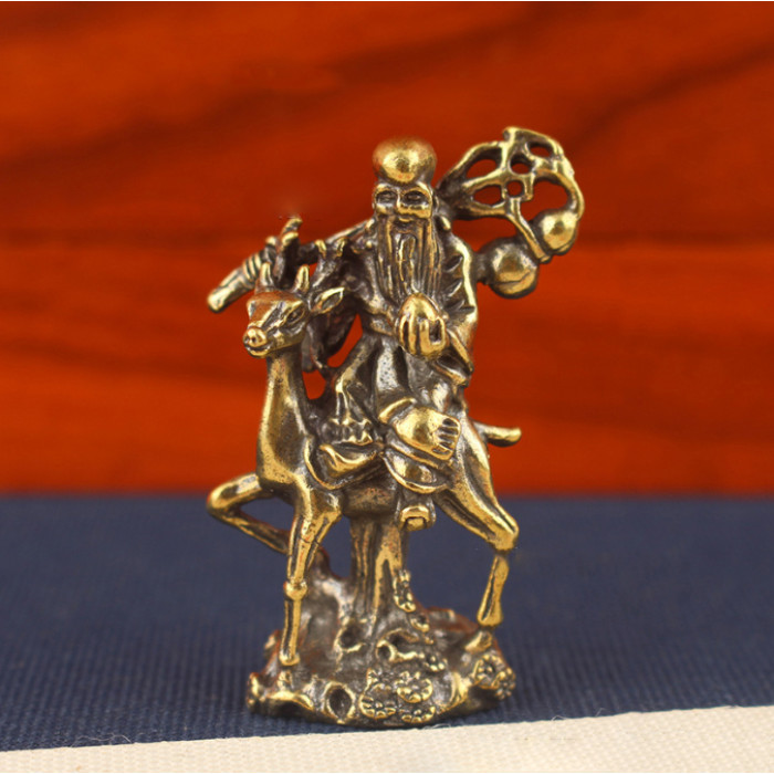 Statuette of Shaw Xin on a deer