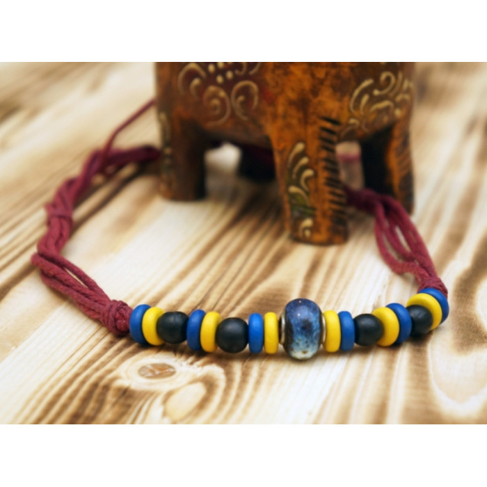 Beads - an amulet from a bone on a lace No. 1